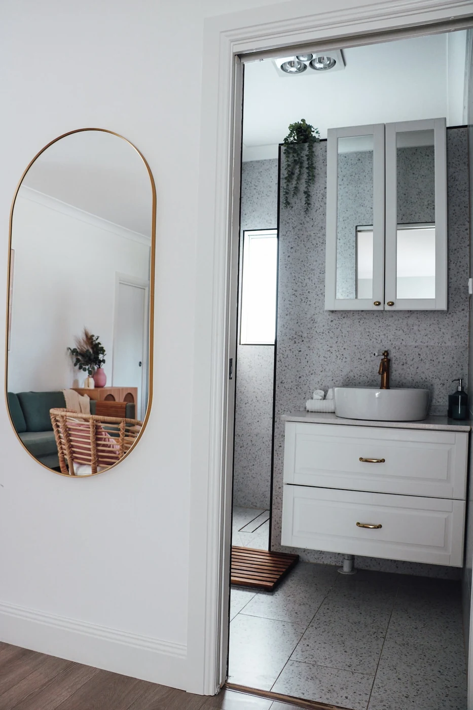 Bathroom vanity and shower at Kos Koliba