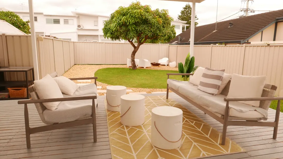 Outdoor seating and backyard at Kos Koliba Holiday Home