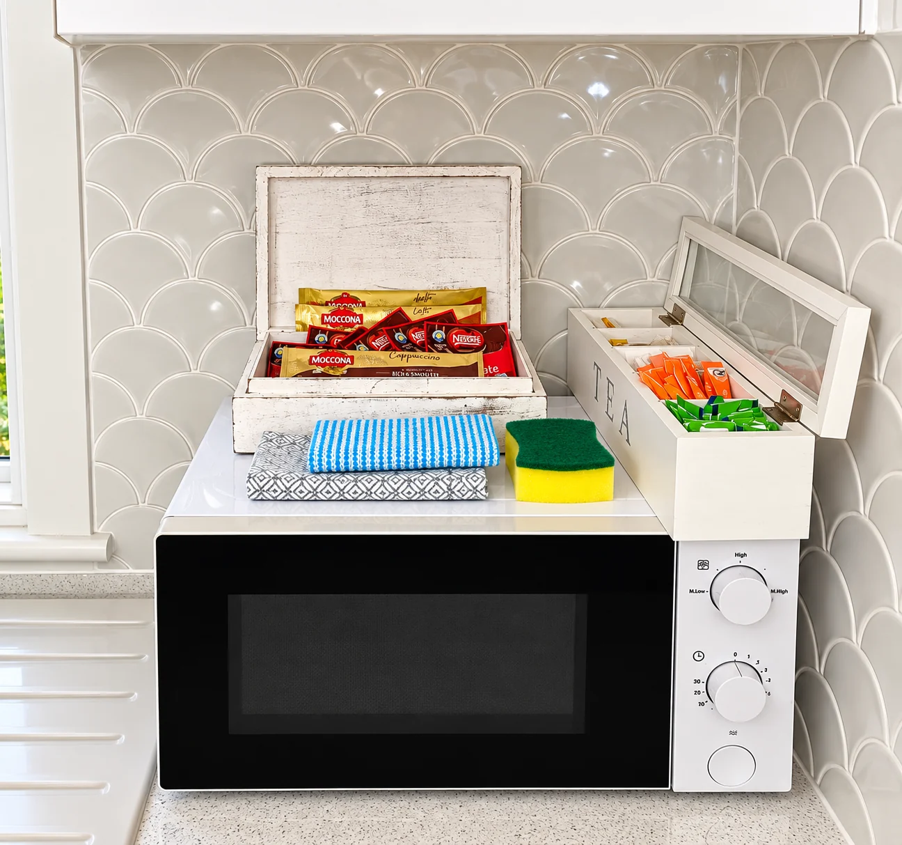 Microwave, tea station and kitchen essentials